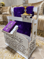 حامل سجادة الصلاة والمصحف الكريم